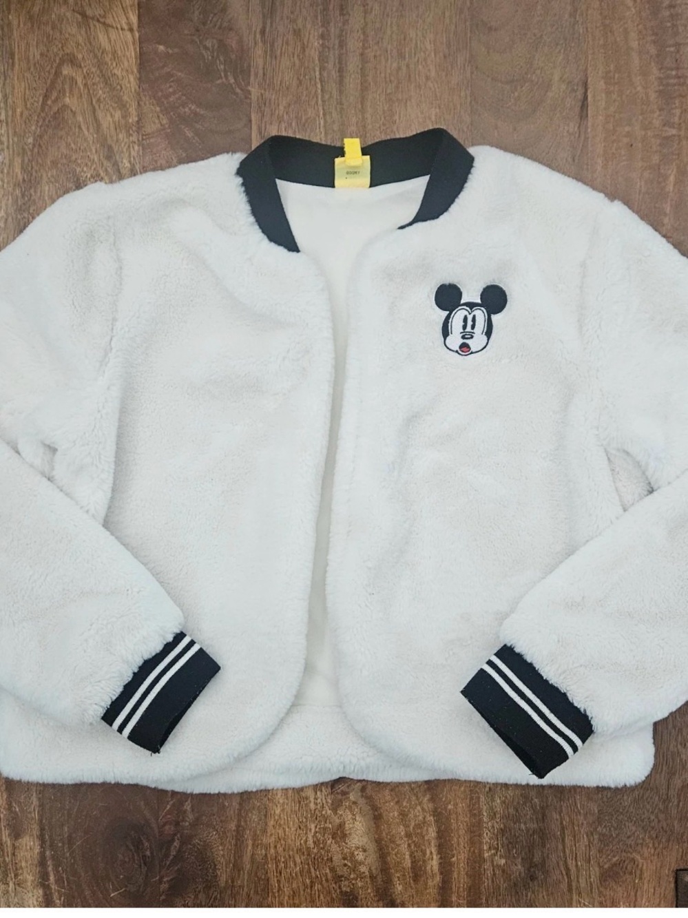 Disney White Plush Jacket with Black Trim and Yellow Label